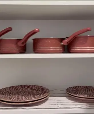 three copper pots and pans sitting on a shelf at 1Bed Apartment - Sleeps 4 - Balcony Wifi Parking in Marrakech