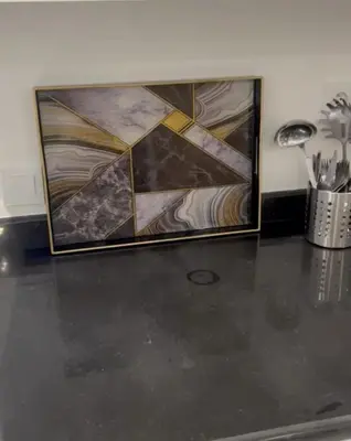a painting sitting on top of a table at 1Bed Apartment - Sleeps 4 - Balcony Wifi Parking in Marrakech