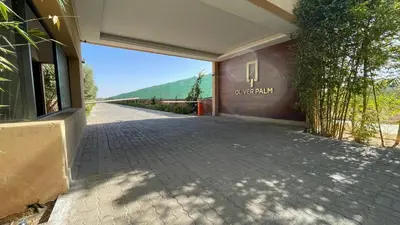 a walkway outside of a building with a window at Duplex Zoé - Contemporain et design à Marrakech in Marrakech