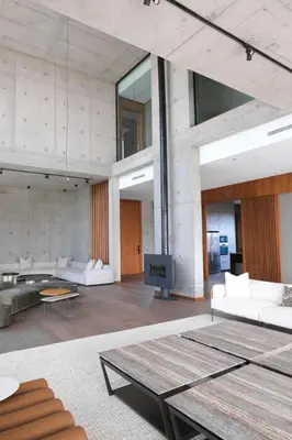 a living room with white furniture and a fireplace at VIP villa in Marrakech
