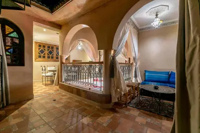 a hallway with a staircase in a house at Riad Dali in Marrakech