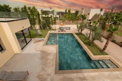 an overhead view of a swimming pool in a house at Villa Design à Marrakech in Marrakech