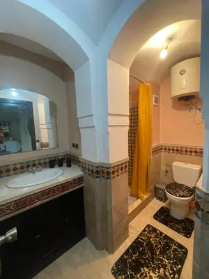 a bathroom with a sink and a toilet at Apartment Gueliz in the best location in Marrakesh in Marrakech