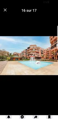 a picture of a swimming pool in front of a building at premium village 106 in Marrakech