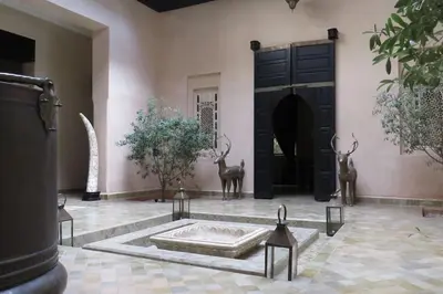 a room with a tub in the middle of a room at Villa Jude in Marrakech