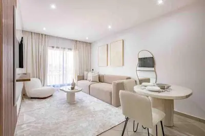 a living room with a couch and a table at New ! Logement Chic, Emplacement Idéal in Marrakech