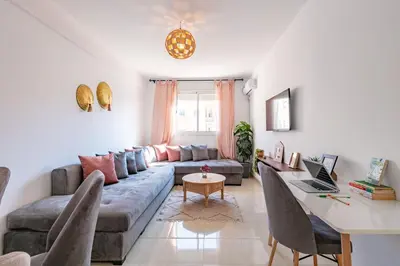 a living room with a couch and a table at Marrakech kamed home in Marrakech