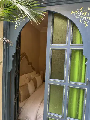 a room with a bed and a window at Riad Atrium & Spa in Marrakech
