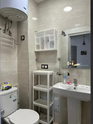 a bathroom with a toilet and a sink at Gueliz Center Home (Starbucks) in Marrakech