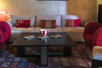 a living room with a couch and a coffee table at Gueliz Gala – Marrakech Centre in Marrakech