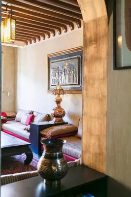 a living room with a couch and a table at Gueliz Gala – Marrakech Centre in Marrakech