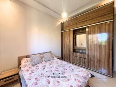a bedroom with a bed and a window at Lucky Nest apartment À Bassatine targa Marrakech à proximité de Hammam Zinaya in Marrakech