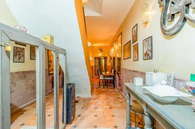 a bathroom with a sink and a mirror at Little Riad 3 Rooms - Top emplacement 5 minuts from Place Jemaa el fna & souk in Marrakech