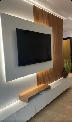 a flat screen tv on a white wall at Résidence Elsalam Marrakech in Marrakech