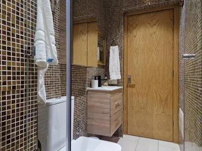 a bathroom with a shower and a toilet and a sink at Marrakeschzentrum Hideaway in Marrakech