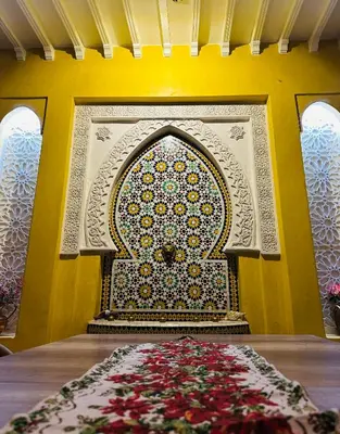 a room with a wall with a mosaic art on it at DAR AL NOUR in Marrakech