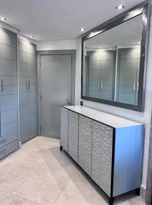 a bathroom with a large mirror on the wall at Superbe appartement de luxe a l'hivernage marrakech in Marrakech
