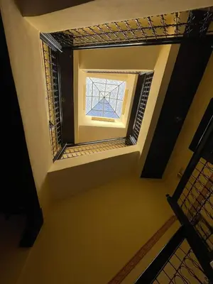 a view of a window in a room at maison noé , residence al quaria ab40 in Marrakech