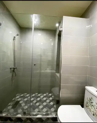 a bathroom with a shower and a toilet in it at Marrakech in Marrakech