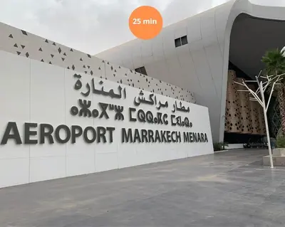a building with a sign for aazport marriott namespace at Riad Tranquility - A Timeless Marrakech Haven in Marrakech