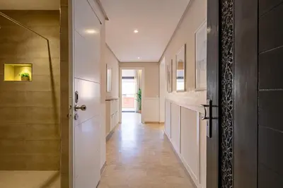 a hallway of a home with a door and a hallway at New! Appartement Diana calme ,Terrasse in Marrakech
