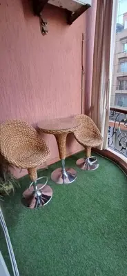 a room with a table and chairs on a balcony at AL ANDALOUS 6 - une chambre in Marrakech