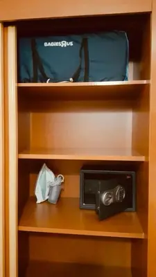 a cabinet with a toaster oven and a bag at Chez Alex in Marrakech