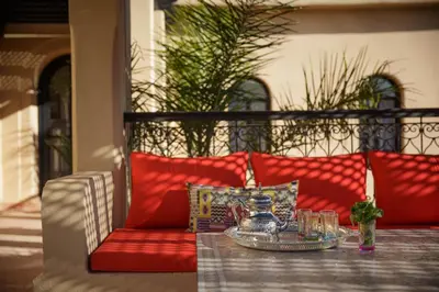 a table with a tray of glasses on a table at Dar Banati Palmeraie in Marrakech