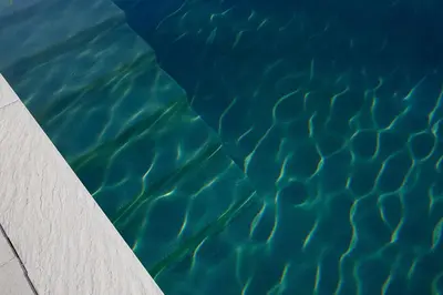 a close up of a pool of water at ADA ADA modern villa with heated private pool next city center in Marrakech