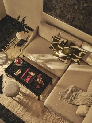 a living room with a couch and a table at IZZA Marrakech in Marrakech