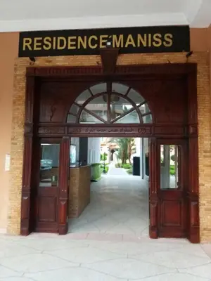 an entrance to a building with a sign that reads resistance manuals at Manis Apartment Set in a Hotel Area in Marrakech