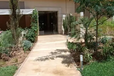 a walkway in front of a building at appartement en résidence in Marrakech