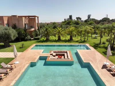 an image of a swimming pool at a villa at Maison Kenoosha Boutique Hotel & Spa in Marrakech