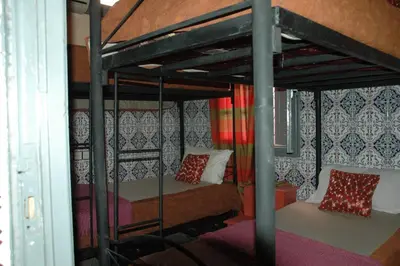 a bedroom with a bunk bed in a room at kech hostel in Marrakech