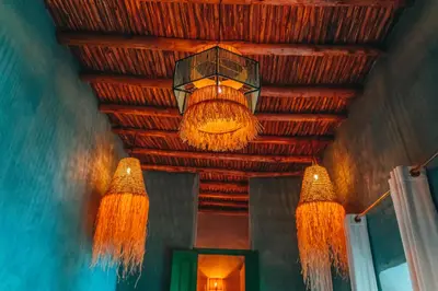 a chandelier hanging from the ceiling of a room at Hotel & Riad Veridis in Marrakech