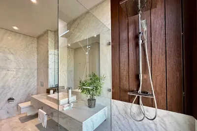 a bathroom with a shower and a sink at Luxury living/Terrace/Pool in Marrakech