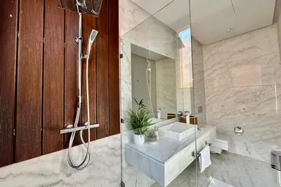 a bathroom with a shower and a sink at Luxury living/Terrace/Pool in Marrakech