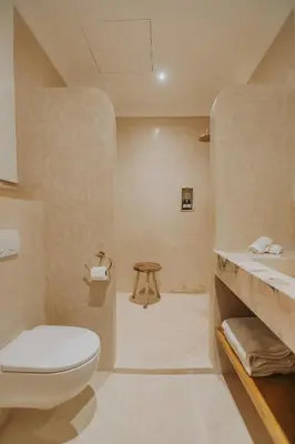 a bathroom with a toilet and a sink at Riad Babel au coeur de la Médina in Marrakech