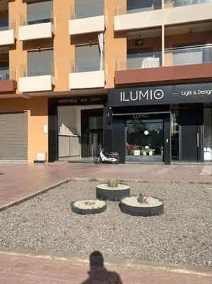 a man is standing in front of a building at Luxury apart à Gueliz Marrakech in Marrakech