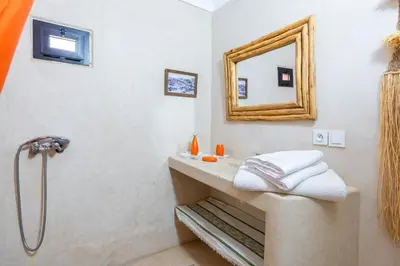 a bathroom with a sink and a mirror at Private Villa Comfort & Relax-Heated Pool in Marrakech