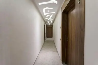 a hallway with white walls and a ceiling at African Dream - Marrakech Centre in Marrakech