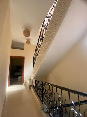 a staircase in a house with a stair railing at Medina House in Marrakech