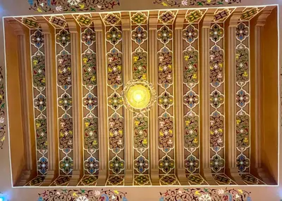 a gold metal wall with a bunch of vases at Villa Al Nour avec piscine in Marrakech