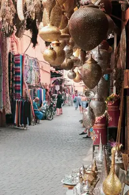 a street with a bunch of shops withience at Villa Al Nour avec piscine in Marrakech