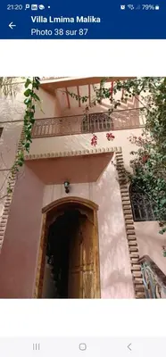 a picture of a building with a door and stairs at Villa Mima in Marrakech