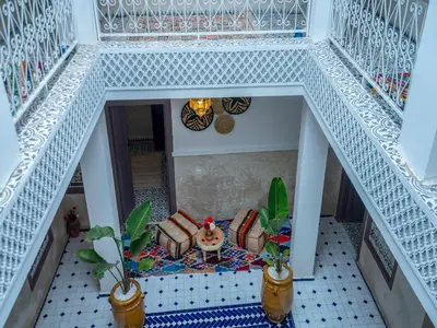 an overhead view of a room with chairs and a table at Riad Tarba & Spa in Marrakech