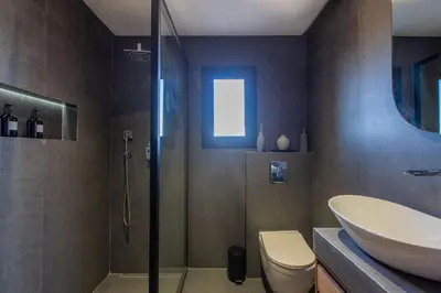 a bathroom with a sink and a toilet and a shower at Palais Rafi in Marrakech