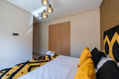 a bedroom with a bed with a animal blanket at Exceptional Style Nonstop Luxury in Marrakech