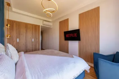 a bedroom with a bed and a sign that reads help at Belle vue, noria golf in Marrakech