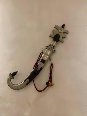 a gun with a red leash on a wall at Riad212 private medina fast Wi-Fi plunge pool in Marrakech